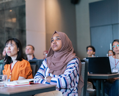 Liverpool Hope University Computer Science graduate Maisha Sadia sits in a lecture at the VISUM summer school.